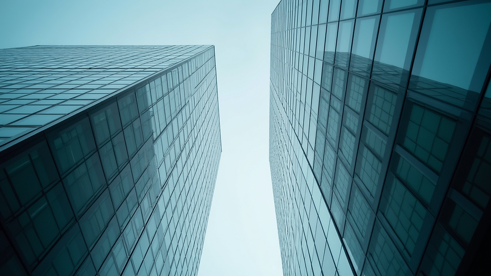Eye-level view of a modern office building with glass facade