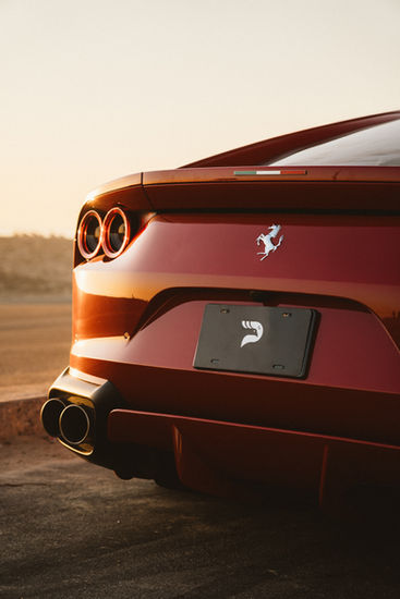 Rear view luxury automotive photograph of Ferrari sports car