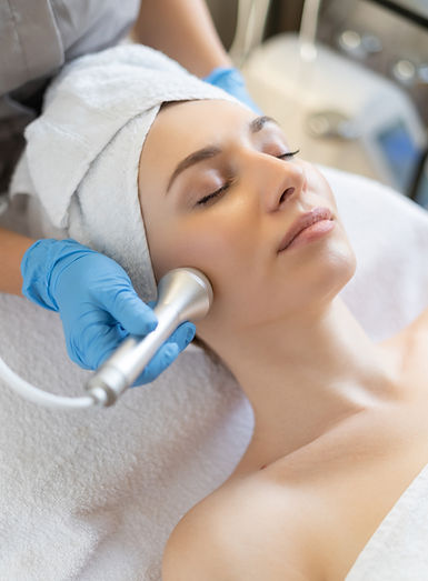 young-woman-lying-cosmetologist-s-table-rejuvenation-procedure-cosmetologist-take-care-abo