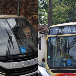 #PraTodosVerem: Imagem dividida ao meio, mostrando dois ônibus urbanos em ambientes diferentes. No lado esquerdo, um ônibus branco e bege com detalhes em preto está estacionado próximo a um muro de pedra. No para-brisa, o letreiro eletrônico indica o destino "TAQUARAL". Há um adesivo azul com símbolo de acessibilidade próximo ao para-brisa. O ônibus tem o nome “Rota Real” na dianteira. No lado direito, um ônibus amarelo claro com detalhes em laranja exibe no letreiro eletrônico a mensagem "TARIFA ZERO!". Também há adesivos azuis indicando acessibilidade na dianteira.