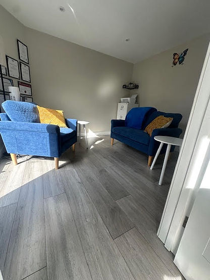 Therapy room with calming coulours of Blue and yellow