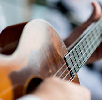 Man Playing Guitar