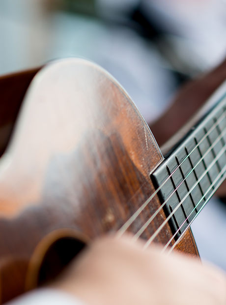 Man Playing Guitar