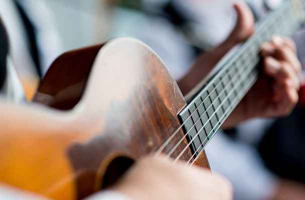 Man Playing Guitar