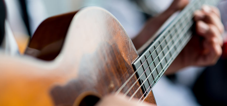 Man Playing Guitar