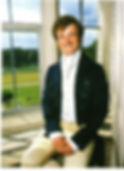 happy-go-lucky actor of the character Mr Bingley posing and smiling