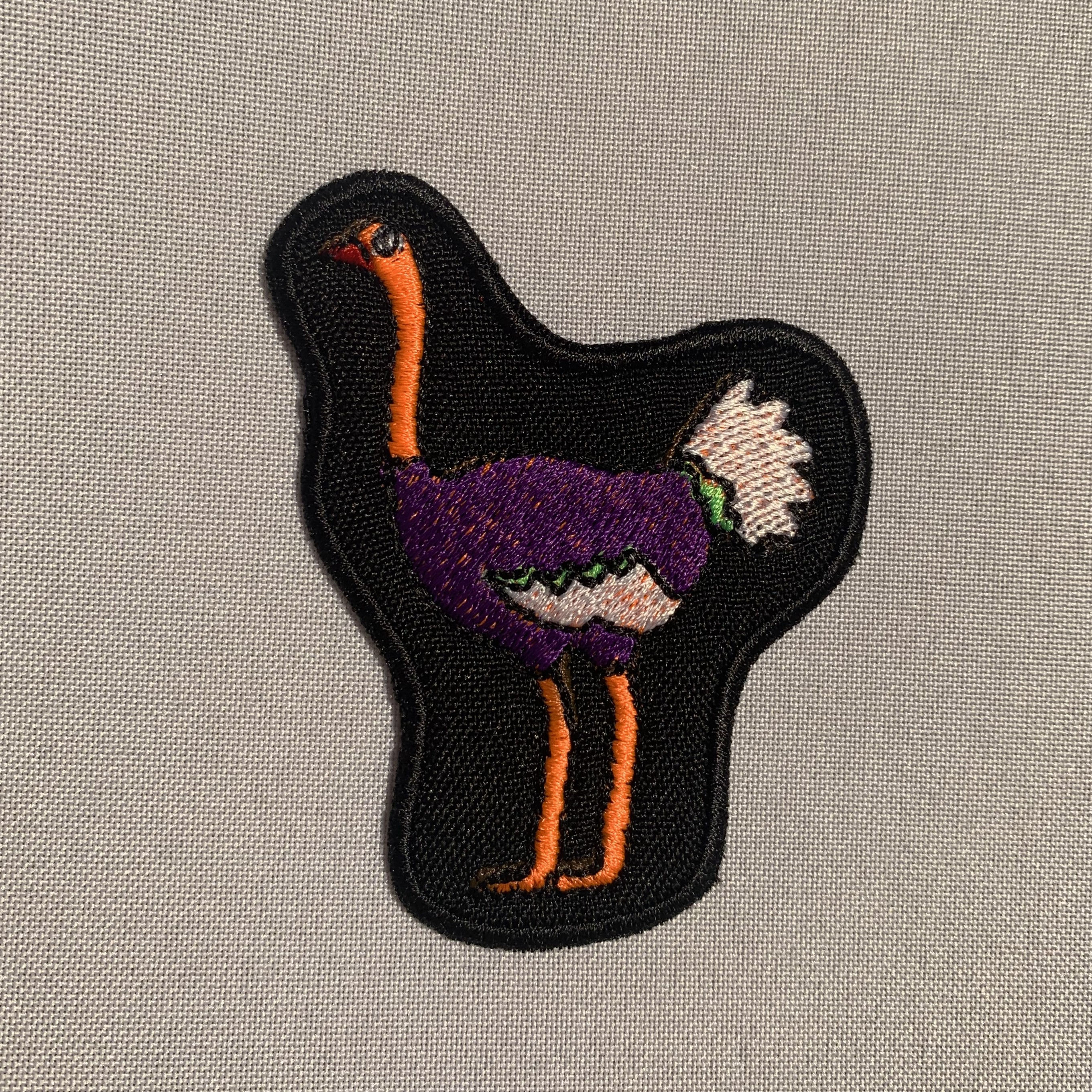 Feather Duster Badge