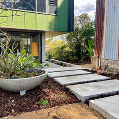 Woolloongabba_garden_concrete_stairs_firepit_backyard_driveway_plants_succulents_tropicals_lighting