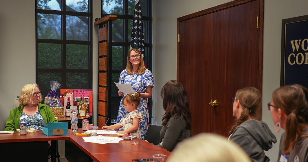Kelly Borg introduces herself to the Women of Work Skills members at the WoW Annual Spring Ladies Night.