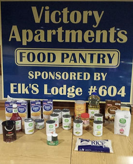 Vicotry Apartments Food Pantry Sign