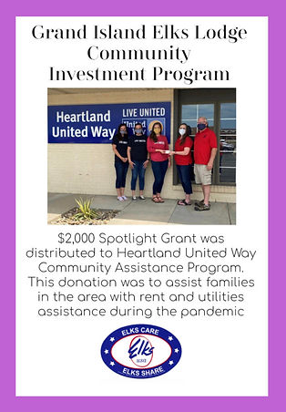 Picture of the Heartland United Way recieving $2,000 from the Spotlight Grant.