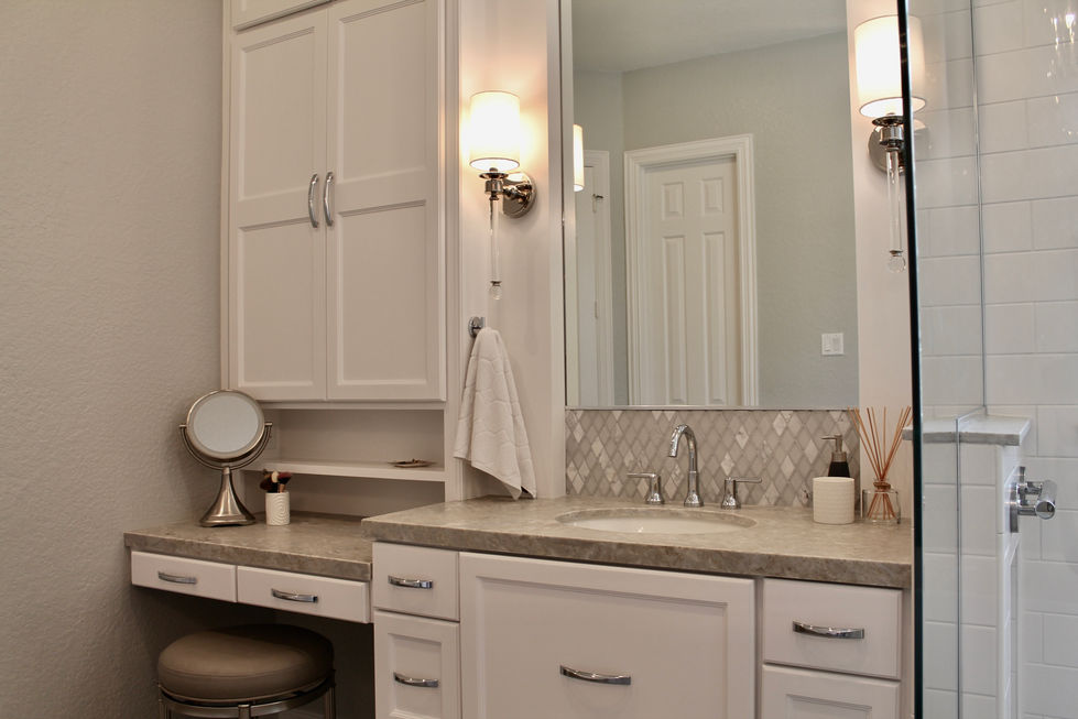 Freestanding Tub, Storage, White Cabinets, Hamper in Vanity, Mosaic Wall Tile, Polished Nickel Fixtures, Quartzite Countertops, Natural Stone Countertops, Large Format Floor Tile, Curbless Shower, Grab Bars, Hidden Shower Niche, Large Custom Mirrors, Sconces, Vanity, Make Up area, Storage, Drawers under Sink, Shower Body Sprayers