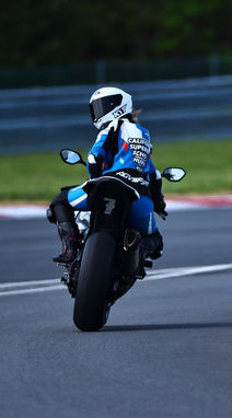 Misti Hurst looks behind her to check the track is clear before pulling out to coach at New Jersey Motorsports Park