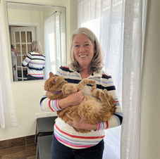 Pet parent with her beloved cat at Faith Veterinary Hospital in Mooresville, NC.