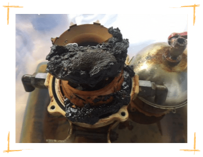 Asphaltene Sludge In Engine Component.