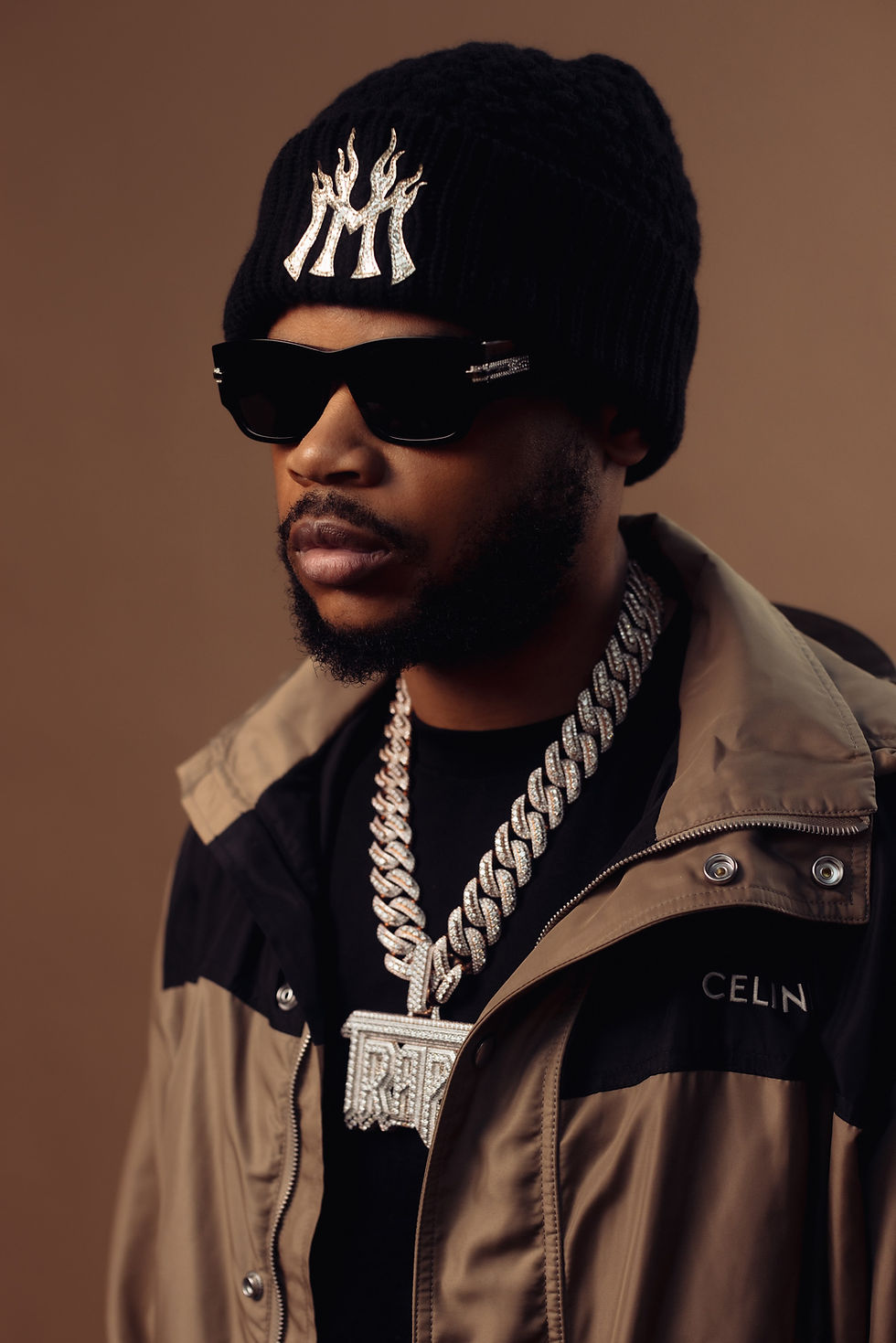 K-Trap wearing sunglasses and a black beanie — supplied press image