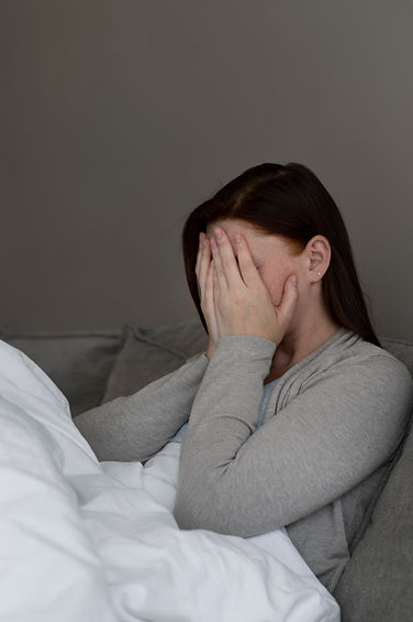 medium-shot-depressed-woman-indoors.jpg