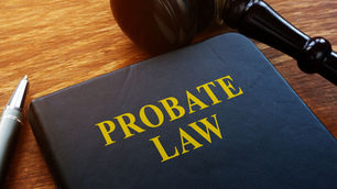 Florida probate law book with judge gavel on desk representing estate administration and legal risks for special needs beneficiaries