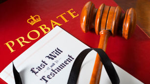 Last Will and Testament, wooden gavel, and red probate file, representing Florida probate requirements and estate legal process