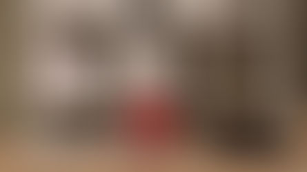 A red model house balanced on a justice scale beside a gavel, symbolizing inheritance, probate, and legal decisions after a parent’s death in Florida.