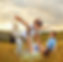 Father lifting child in a field while mother and sibling smile, symbolizing joy, security, and Legacy Solutions Law Firm.