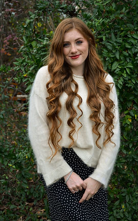 Female redhead professional mental health counselor therapist