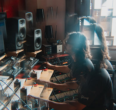 Recording engineer working in studio environment