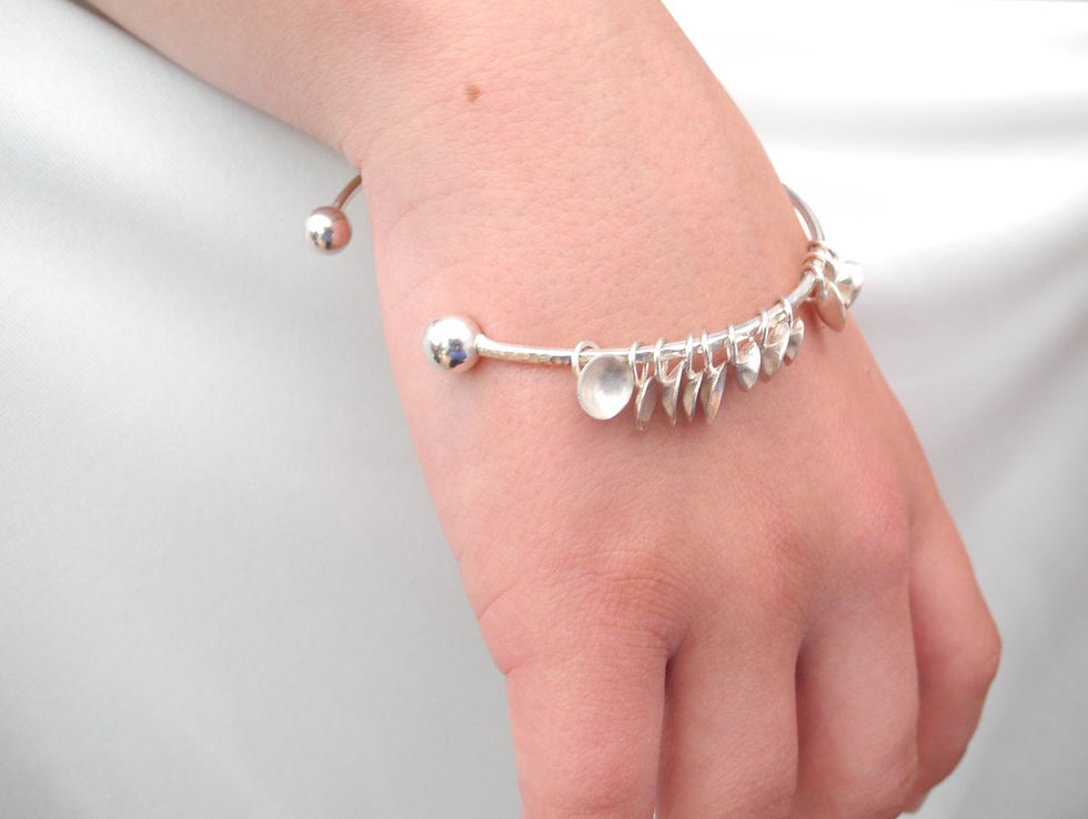 Thumbnail:  Elements floating silver bangle
