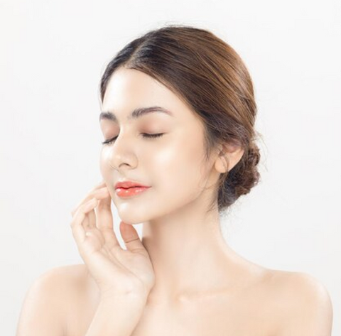 Bust of woman model with beautiful facial make-up