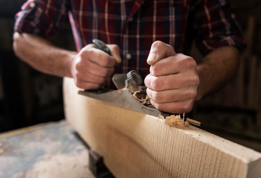 Hand-finishing detail work in the workshop