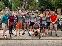 The red fox team stood in front of a play area