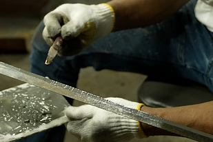 Traditional Japanese katana patterning with clay by swordsmith