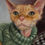 Thumbnail: The final framed oil painting of José the cat, hanging in a home setting to show scale and the natural wood frame