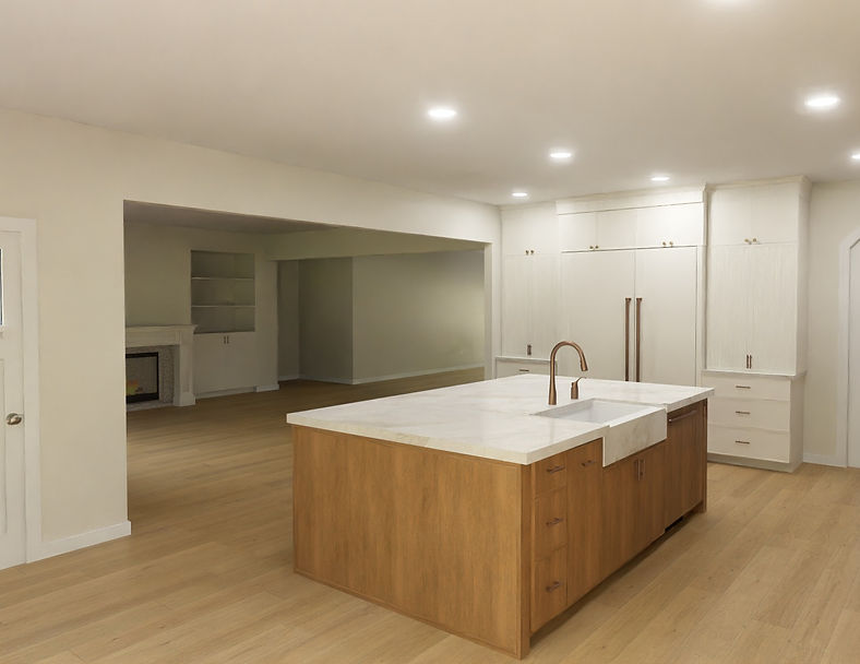 Modern kitchen island with wood base and white countertop