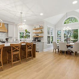kitchen with modern white accents and solid wood cabinets