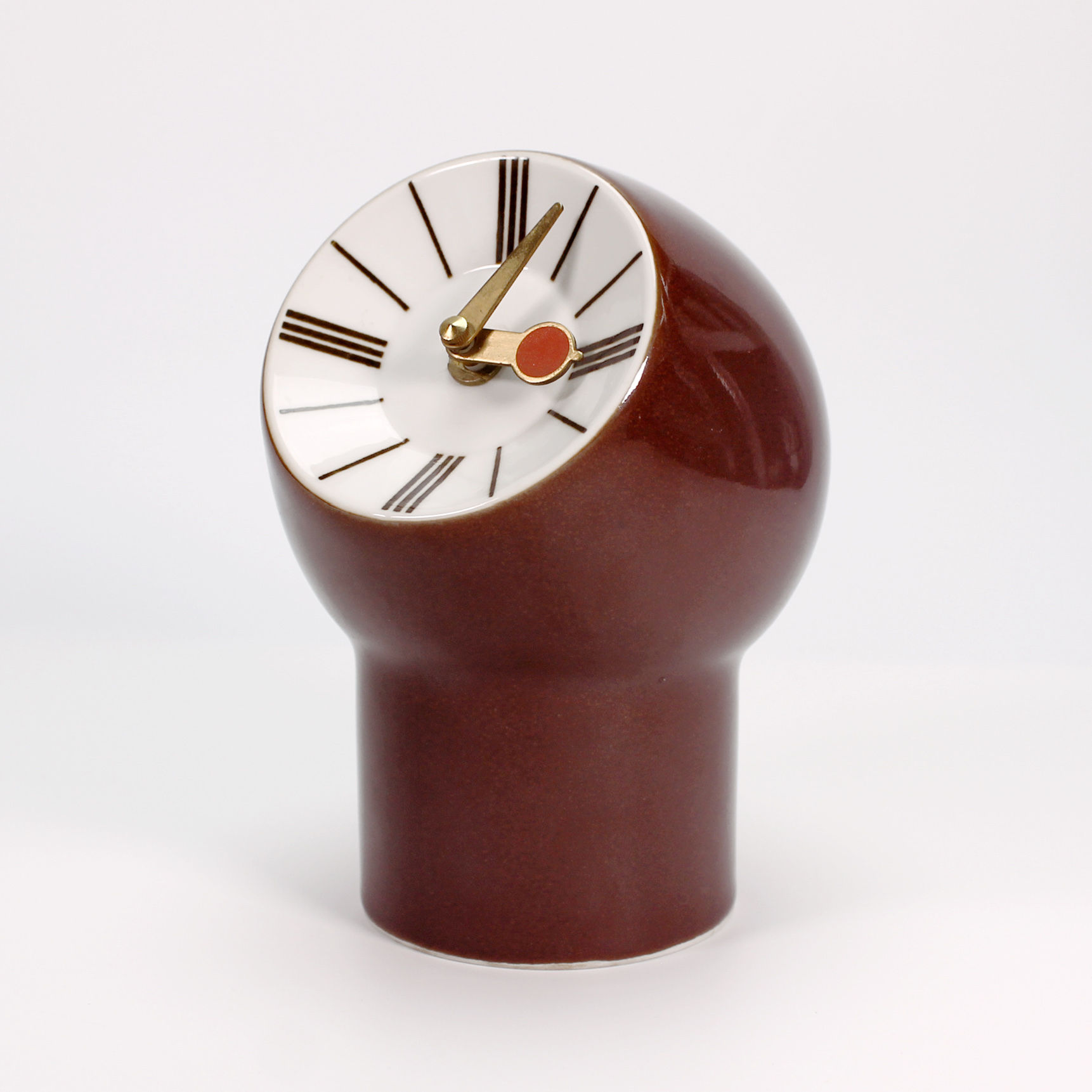 royal copenhagen dark red table clock watch porcelain oxblood mid-century danish design Snorre Læssøe Stephensen atomic læsø