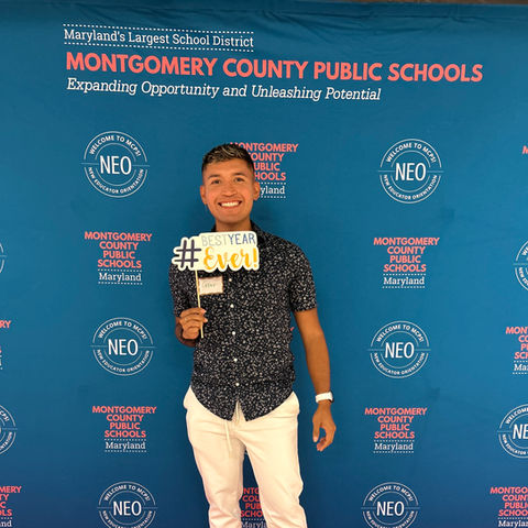 ESOL educator Julio César Manzano at a Montgomery County Public Schools event — classroom practice and ELD leadership