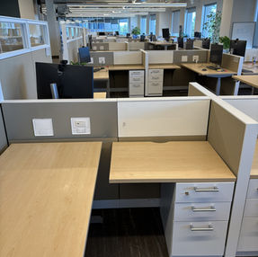 Corner Steelcase Answer 42H station with glass, aisle perspective.