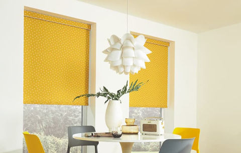 Custom made roller blinds with matching pelmet in yellow patterened fabric. Get Real Secure services Brisbane's inner suburbs and all surrounding areas.