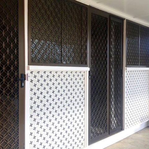 Before photo of outdated diamond grille security screens which were removed by Get Real Secure and replaced with Prowler Proof ForceField stainless steel security screen hinge and sliding doors. Get Real Secure services Brisbane's inner suburbs, including Lutwyche, Wooloowin, Alderley, Ashgrove, Bardon, Newstead, Camp Hill, Albion, Clayfield, Northgate, Carseldine and all surrounding areas.