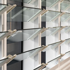 Prowler Proof ForceField stainless steel fixed window security screen installed on louvre windows of home in Kalinga by Get Real Secure, Stafford Heights