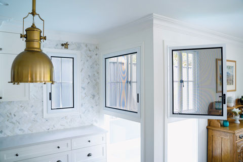 Kitchen of newly built home in Bardon, fitted with Prowler Proof Hinge Window security screens by Get Real Secure, Stafford Heights.