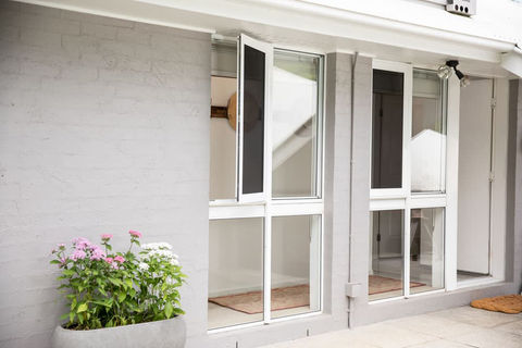 Prowler Proof's Hinge Window security screen can be opened and closed with the dual-action handle for easy access to windows, without compromising on security.