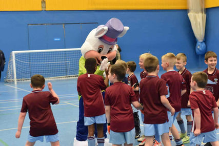 Mascot at kids football event