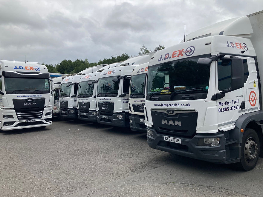 Parked haulage trucks with JD Express branding