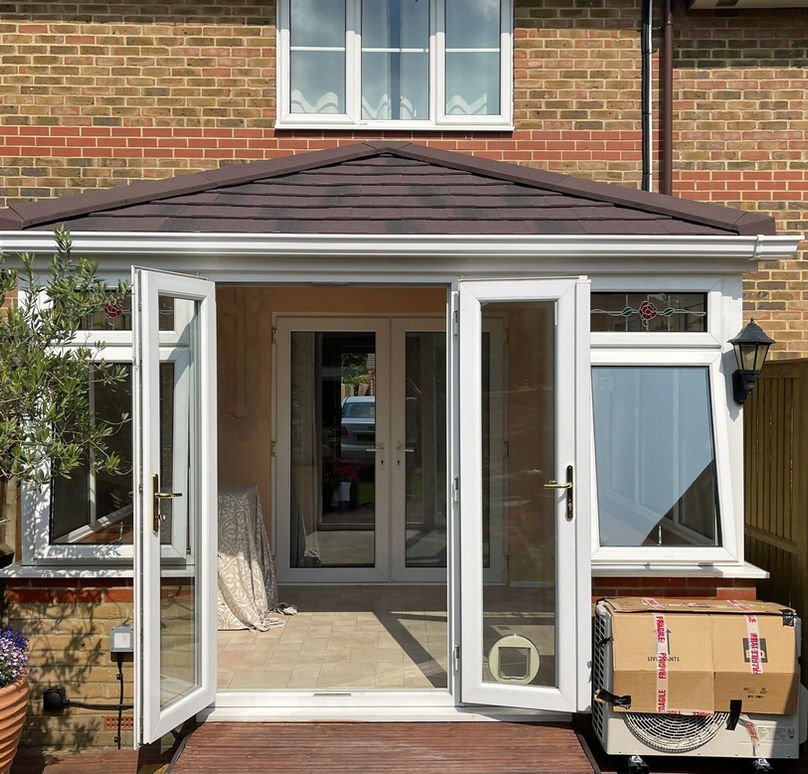 UPVC French door installation on conservatory
