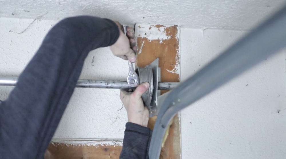 How to Replace Your Garage Door's Torsion Springs Like a Pro