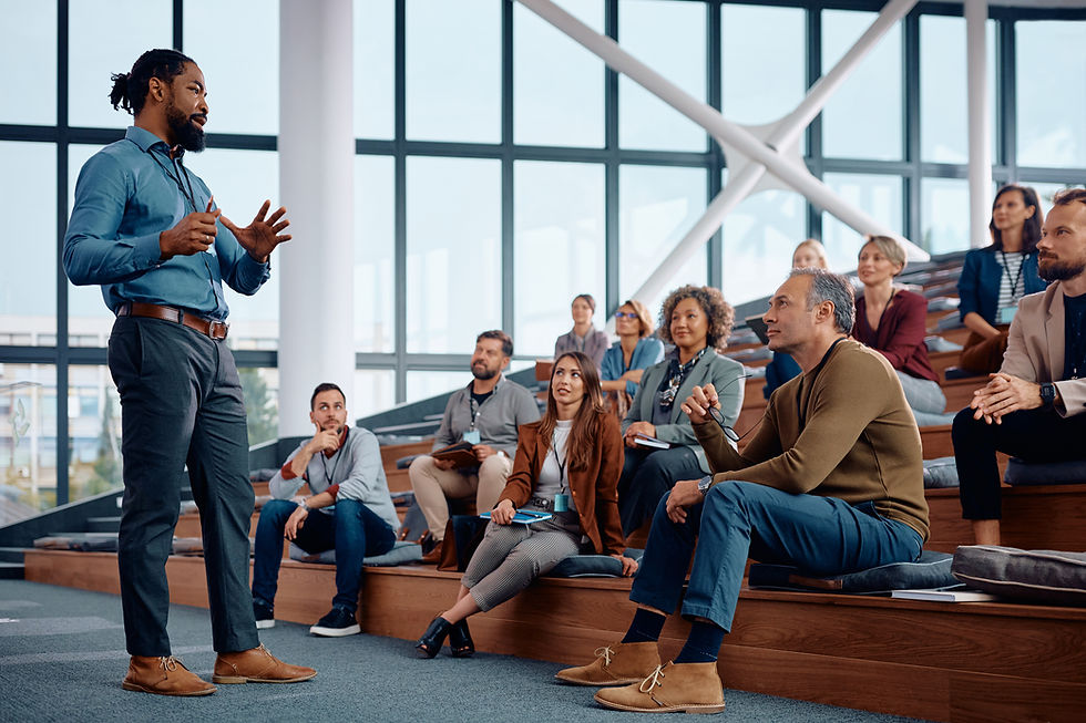 A group of people attend a workplace performance workshop