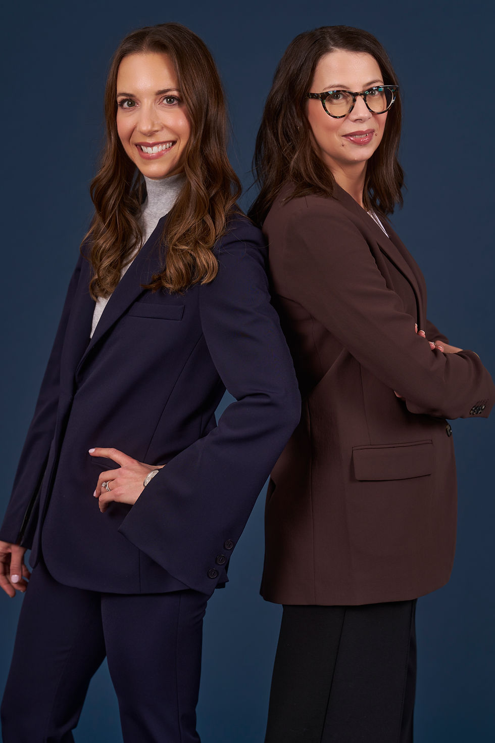 Dr. Marcie Dudeck and Dr. Tali Burstein, clinical psychologists, pose for a professional headshot for Interplay Advisory.