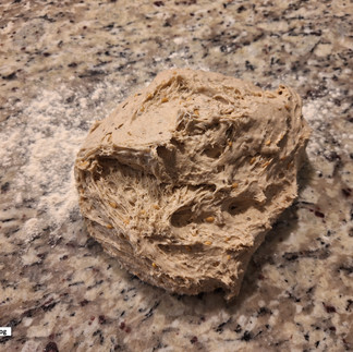 Gently shape the dough into a round or oval on a lightly floured surface. Place seam-side up in a floured banneton or parchment-lined bowl. Cover and let proof for another 1.5 to 2 hours until soft, airy, and springy to the touch.